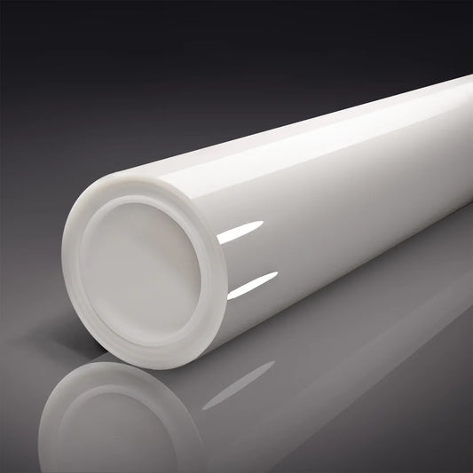 Clear roll of Paint Protection Film  on a reflective surface with a dark background